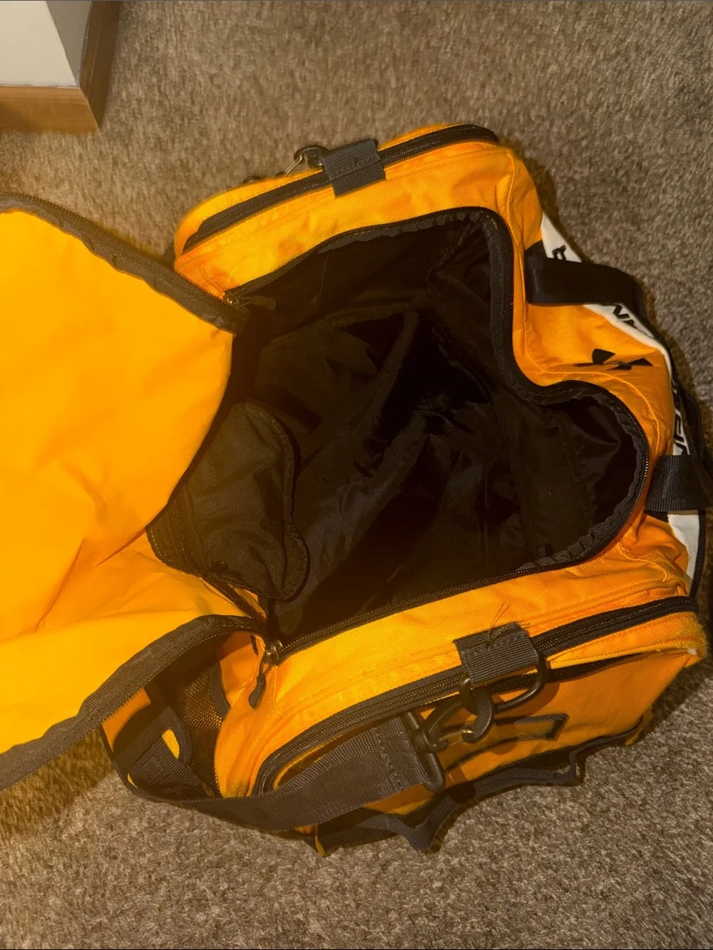 Under Armour Men's Orange Duffel Bag with Black Accents